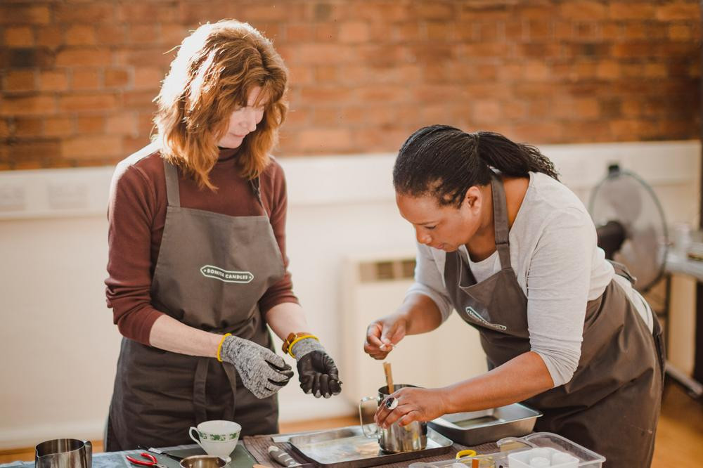 Two women at a candle making class